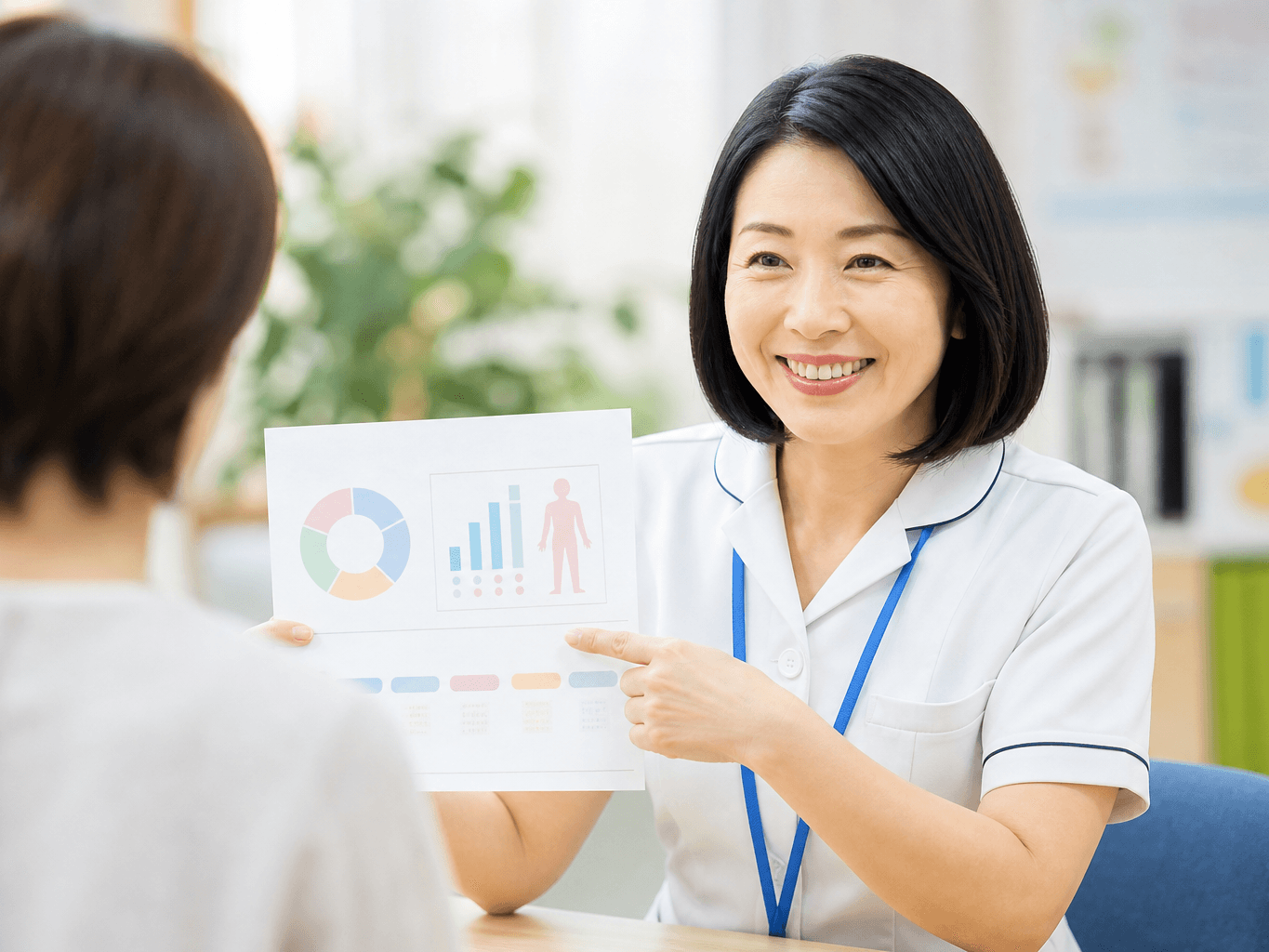 健康相談に応じる保健師 - Public Health Nurse Providing a Consultation